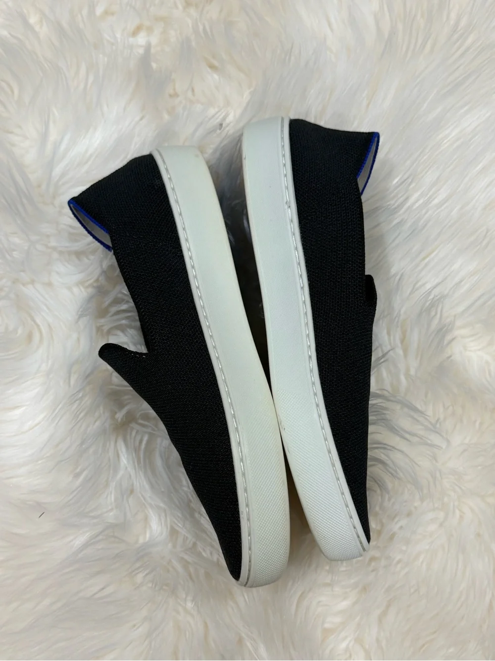 Rothy's Black Knit Slip-On Sneakers with Blue Accent